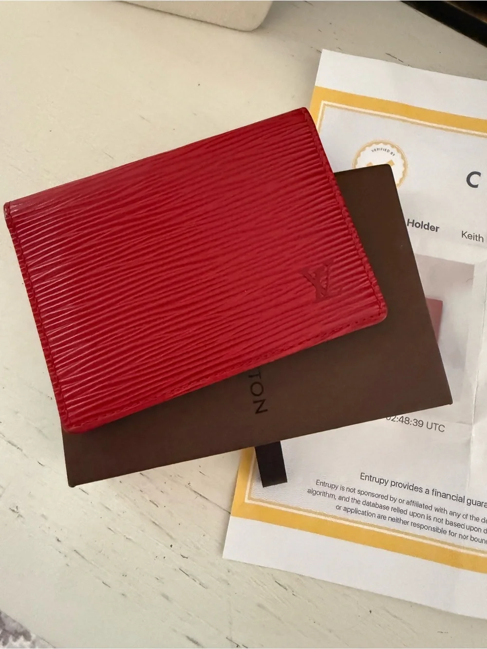 Louis Vuitton authenticated great condition red Epi leather credit card